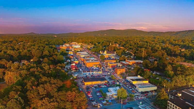 drone shot of town at suset